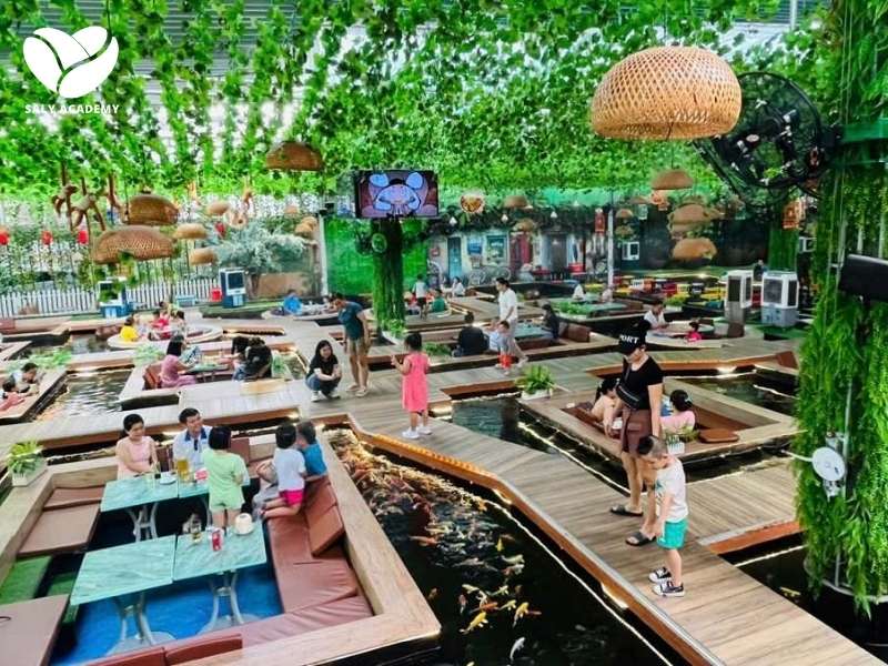 Bố trí không gian quán hài hòa với hồ cá Bố trí không gian quán hài hòa với hồ cá